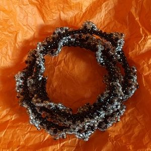 Necklace with 'lace' design on stiff wire